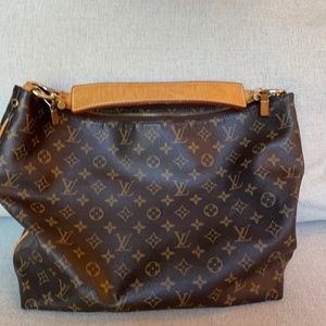 Louis Vuitton shoulder bag.